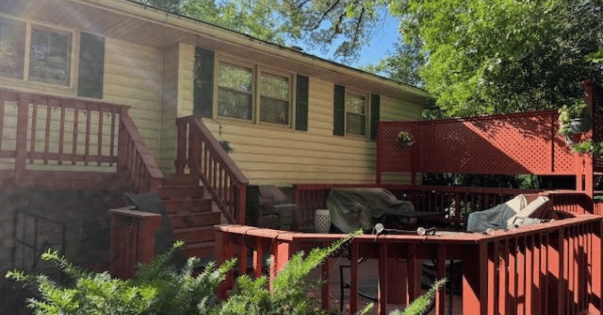 Before photo: large deck and patio space