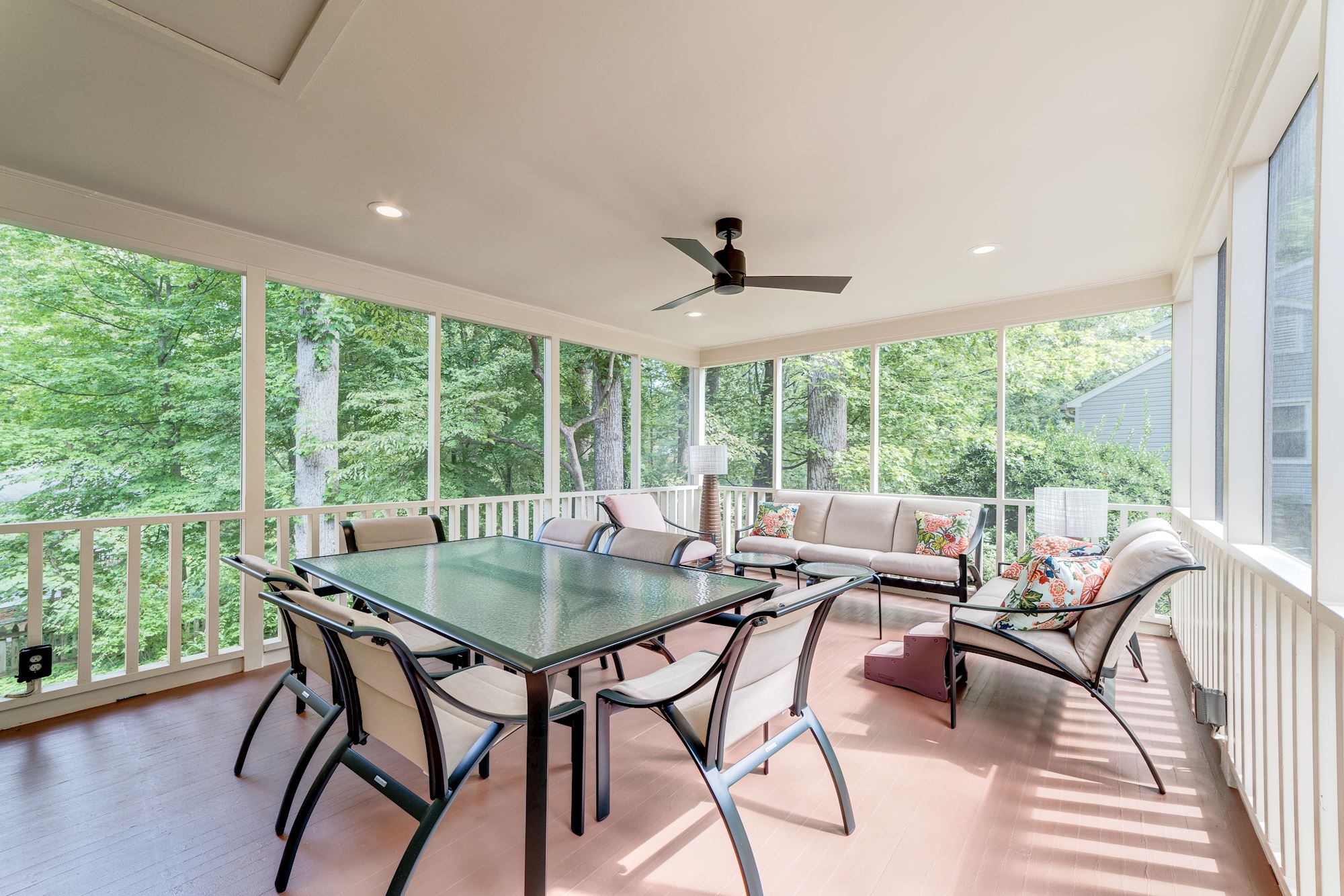 Screened porch with roof and ceiling fan
