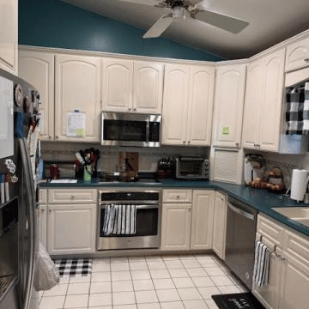 Before photo: dark, closed off kitchen