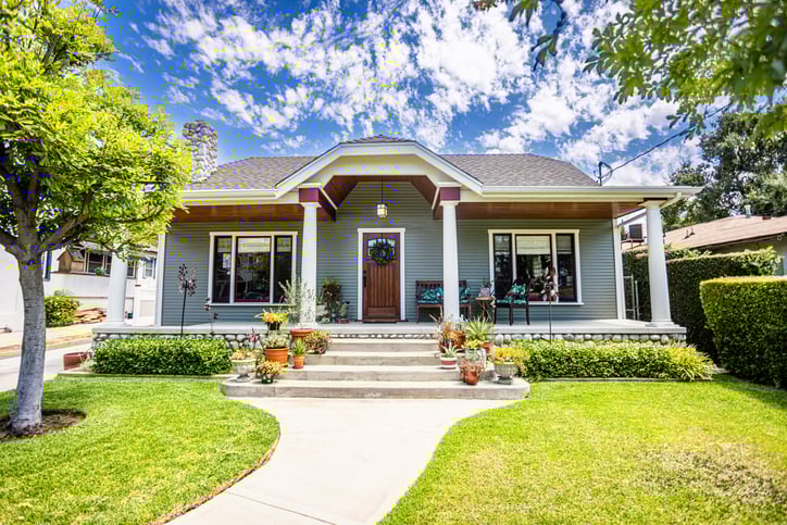 Freshly painted Craftsman bungalow house with bright sunny light 